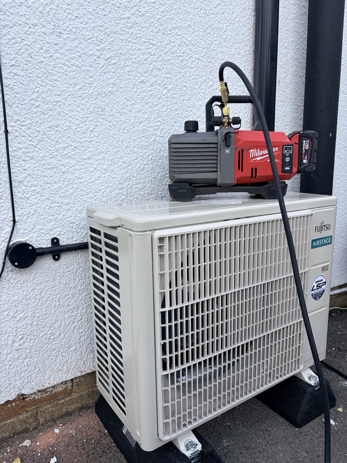 Outdoor system being serviced