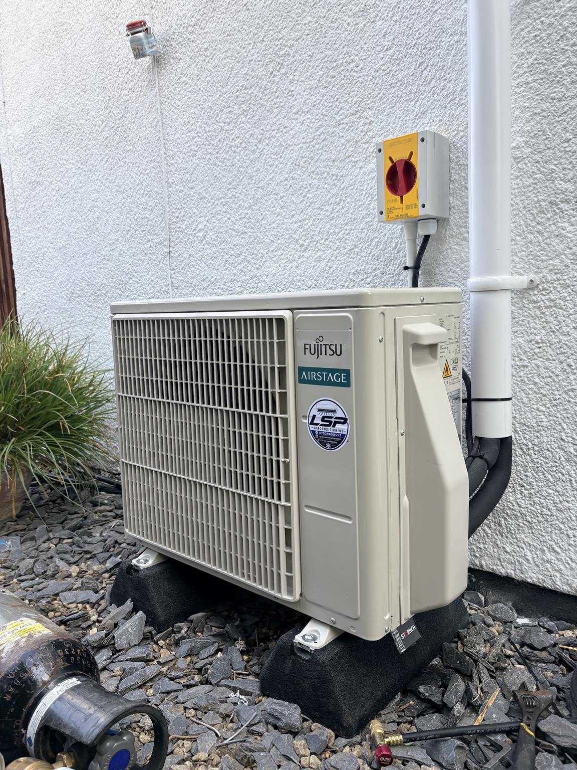 Outdoor unit at ground level
